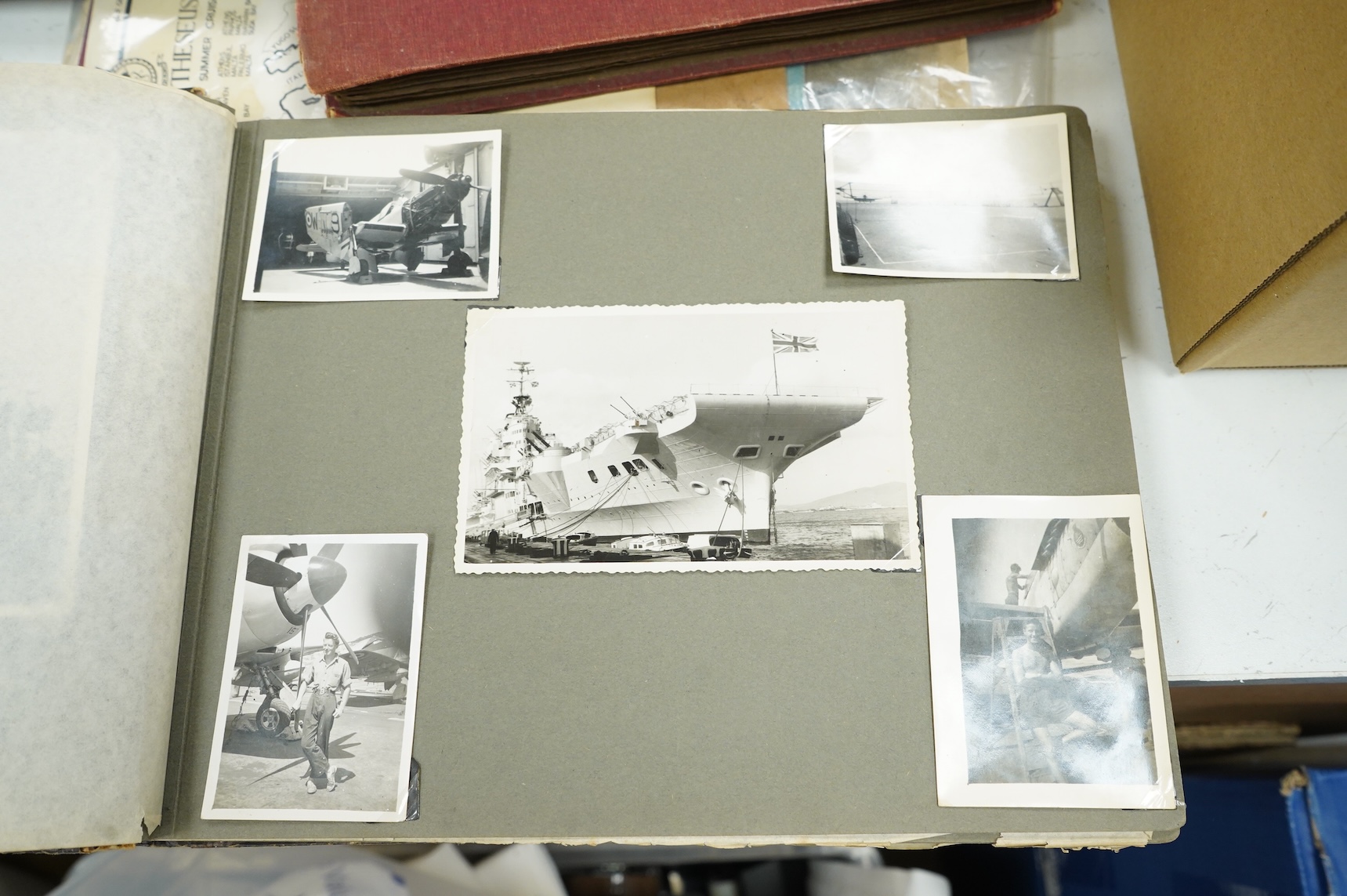 Four early 20th century photograph albums of military, naval and aviation interest, including; naval officers, sailors, ships and harbours, personal photographs, HMS Colossus, Cape Town in January 1946, RAF aircraft incl
